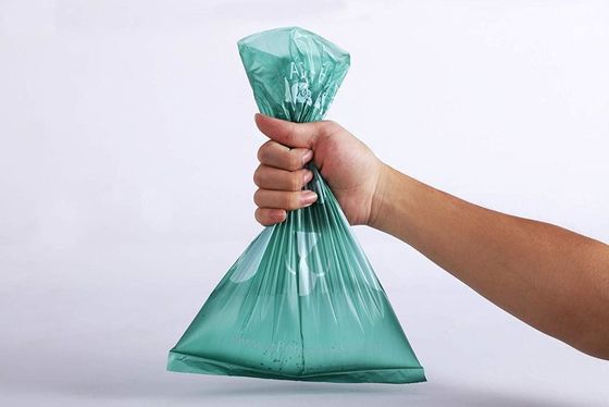 Βιο διασπάσιμες τσάντες επίστεγων αντι δακρυ'ων φιλικές προς το περιβάλλον με το διανομέα