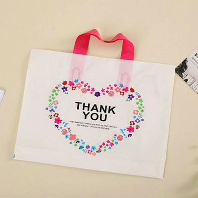 Η λιανική τσάντα αγορών για τα παιδιά προσάρμοσε τη μίας χρήσης πλαστική τσάντα δώρων τυπωμένων υλών με τη λαβή εύκολη να φέρει