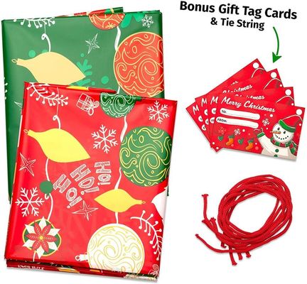 Ζωηρόχρωμες πλαστικές τσάντες περικαλυμμάτων δώρων σχεδίου συνήθειας για την τεράστια παρούσα συσκευασία Χριστουγέννων